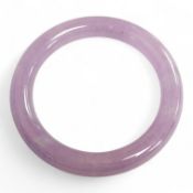 A lavender hardstone bangle, 8cm wide