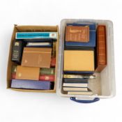 A collection of various stamps, mostly in albums