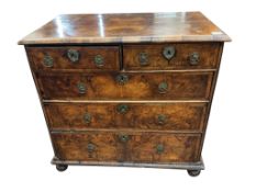 A Queen Anne walnut chest, with bun feet, width 92cm, depth 55cm, height 86cm