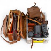 A collection of photography accessories including; two Konica lenses, a Minolta lens, a Makinon lens