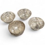 A set of three late 19th/early 20th century Chinese Export pierced white metal bowls, decorated with