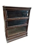 A Globe Wernicke style oak three section bookcase, width 86cm, depth 27cm, height 115cm