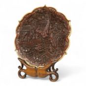 A Chinese lacquer foliate-shaped dish on stand, 18cm in diameter