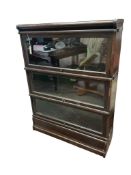 A Globe Wernicke oak three section bookcase, width 86cm, depth 27cm, height 116cm