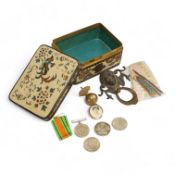 A large cloisonné enamel box containing a cast mask handle, an oval hair pendant, coins and