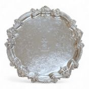 A George V silver waiter, with engraved crest and shell and scroll border, Deykin & Harrison,