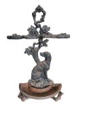 A Victorian Coalbrookdale style cast iron stick stand, width 42cm, height 70cm with semi circular