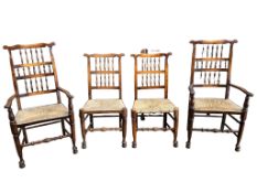 A harlequin set of eight (six plus two) Derbyshire style elm and beech rush seat spindle back dining