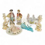 A pair of Sitzendorf figurines, damage to one, a pair of candlesticks, a Rye pottery dish, a Moore