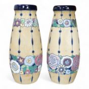 A pair of pottery Czech Amphora Art Deco pottery vases, with unusual high enamel stylised floral