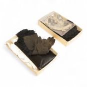 A cut steel fronter, a jet beaded panel, a pair of fringed black suede gauntlets, a seed pearl