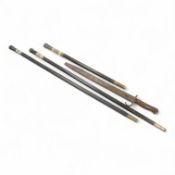 Three early 20th century Indonesian bone overlaid sword sticks and a bayonet, largest 92cm in