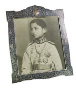 A large early 20th century Siamese silver and niello mounted rectangular photograph frame,