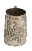 A Victorian silver mug, embossed with interior scene and imbibers, by John Harrison & Co