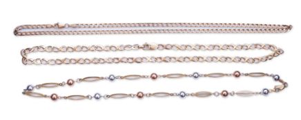 Three gold necklaces