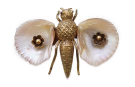 A gold and shell brooch, late 19th century composite