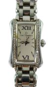 A lady's 2007 stainless steel and diamond set Carl F. Bucherer quartz wrist watch, on a stainless st