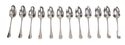 A set of twelve George III silver Hanoverian pattern table spoons by Walter Tweedie, the terminals e