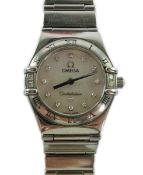 A lady's 2002 stainless steel and diamond set Omega Constellation quartz wrist watch