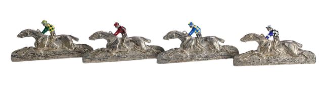 A set of four Elizabeth II silver and enamel menu holders, by Garrard & Co, each modelled as a raceh