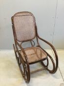 An early 20th century caned beech bentwood rocking chair, width 50cm, depth 112cm, height 98cm
