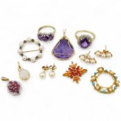 A collection of jewels, comprising: two amethyst and diamond rings; a cultured pearl and circular-