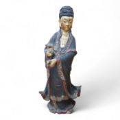 A Chinese partially gilt papier-mâché figure of Guanyin, 63cm high