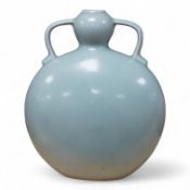 A Chinese celadon glazed two handled moon vase, 24cm high