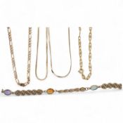 Three necklaces and two bracelets, comprising: a gold figaro chain and a flat fancy link chain, each