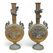 A pair of 19th century Japanese bronze moonflasks, with dragon motifs, 35cm high