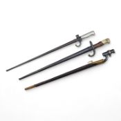 Three bayonets; a gras bayonet, a Lebel bayonet and an Indian Enfield style triangular socket