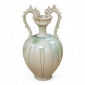 A Chinese green glazed terracotta ‘dragon’ handle vase, 42cm