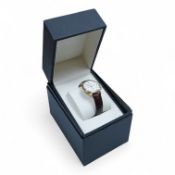 A boxed modern Christopher Ward of London gilt stainless steel chronograph quartz wrist watch,