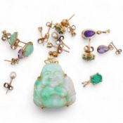 A collection of earrings and two pendants, comprising: two pairs and one single diamond studs,