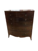 A Regency mahogany bow fronted chest, fitted two short and four long graduated drawers, width 106cm,