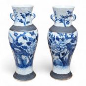 A pair of Chinese blue and white crackleware baluster vases, early 20th century, 26cm high