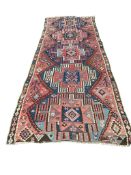 An early 20th century Turkish red ground flat weave Kilim runner, 430 x 138cm