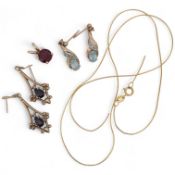 A group of jewels, comprising: a pair of garnet drop earrings; and a broken gold chain, each in