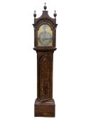 A George III simulated mulberry eight day longcase clock, the arched brass dial with strike silent