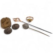 A collection of jewellery, comprising: a brooch, pair of earrings and a stick pin set with lava
