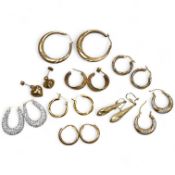 Nine pairs of earrings, comprising: seven hoop earrings, two of which set with pastes; and two pairs