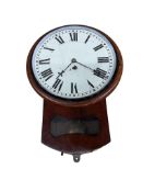 A Victorian mahogany drop dial wall timepiece, with painted Roman dial and visible pendulum,