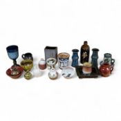 A collection of studio pottery to include a Celtic pottery Newlyn goblet, various jugs and bowls,