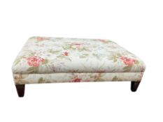 A large rectangular floral buttoned upholstered ottoman footstool, width 118cm, depth 88cm, height
