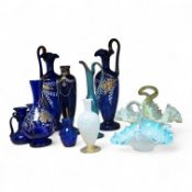 A collection of Bristol blue glassware to include enamel and gilt decanters, together with other