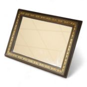 A Viennese strut mirror with inlaid metal detail, marked verso ‘Fr. Rosenberg Wien Graben 17’, 43