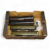 Four 0 gauge 1930s wooden Bonds bogie coaches; three Southern Railway; a Composite Brake, and two