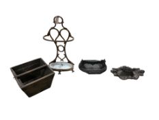 A late Victorian painted cast iron stick-stand, height 70cm, two Victorian cast iron boot scrapers