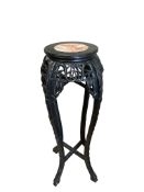 A Chinese marble topped vase stand, diameter 34cm, height 90cm