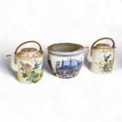 A pair of Chinese large scale teapots and a European blue and white planter, 22.5cm